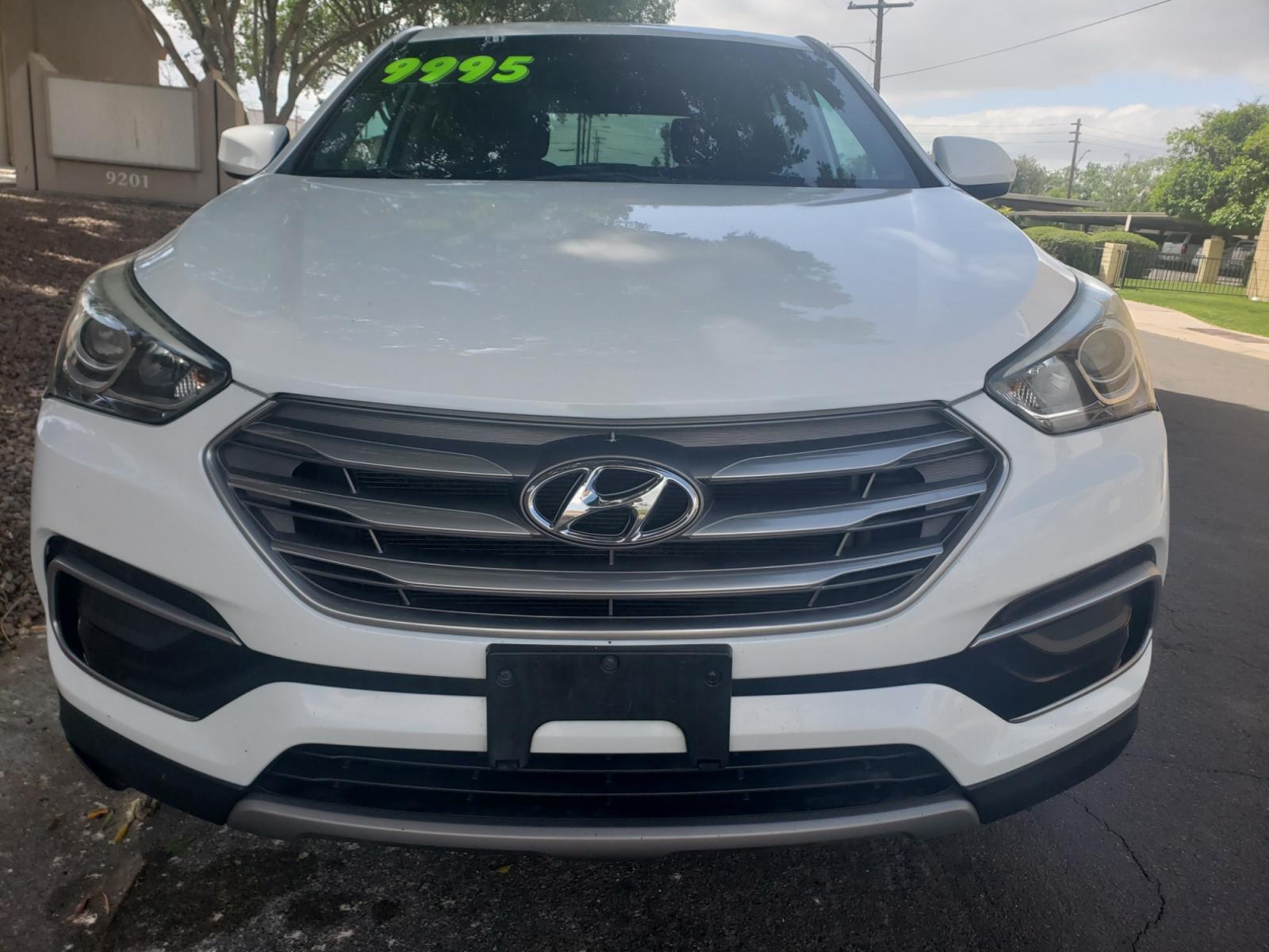 2017 WHITE /gray and black Hyundai Santa Fe SE sport (5NMZT3LB6HH) with an 2.4L L4 DOHC 16V engine, 4-Speed Automatic transmission, located at 323 E Dunlap Ave., Phoenix, AZ, 85020, (602) 331-9000, 33.567677, -112.069000 - 2017 Hyundai Santa Fe Sport,........A Must See!! No accidents, Ice cold AC. The SUV is gorgeous inside and out. Power windows, Power door locks, Touch screen Stereo/CD Player, Phone sync, Bluetooth, Backup camera, Beautiful gray and black interior with gray cloth seats in near perfect condition, Inc - Photo #1